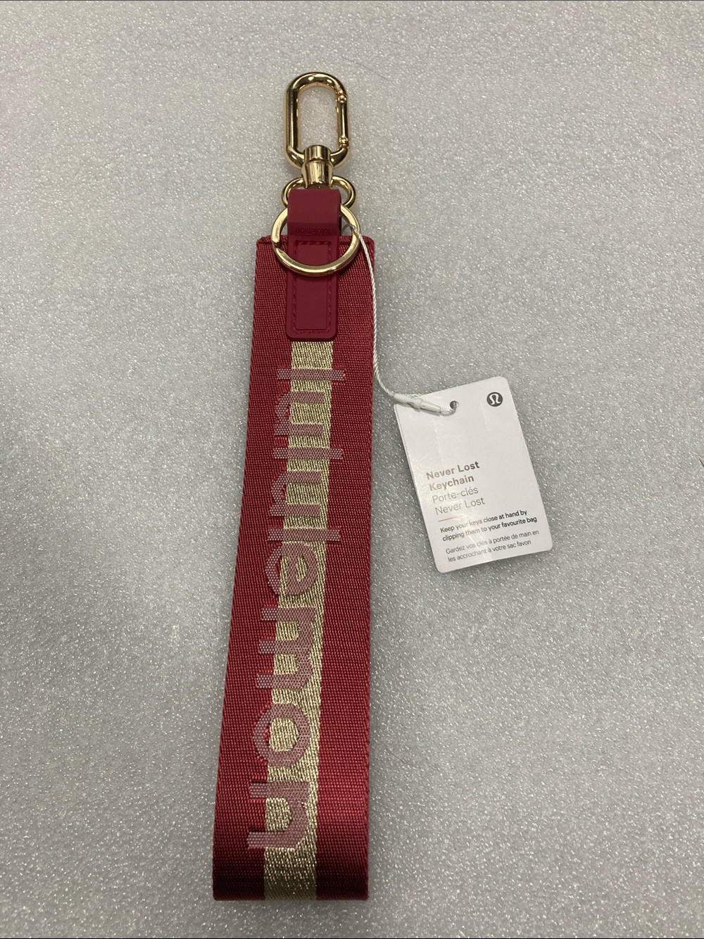 lululemon athletica Never Lost Keychain Wristlet - Maroon with Gold